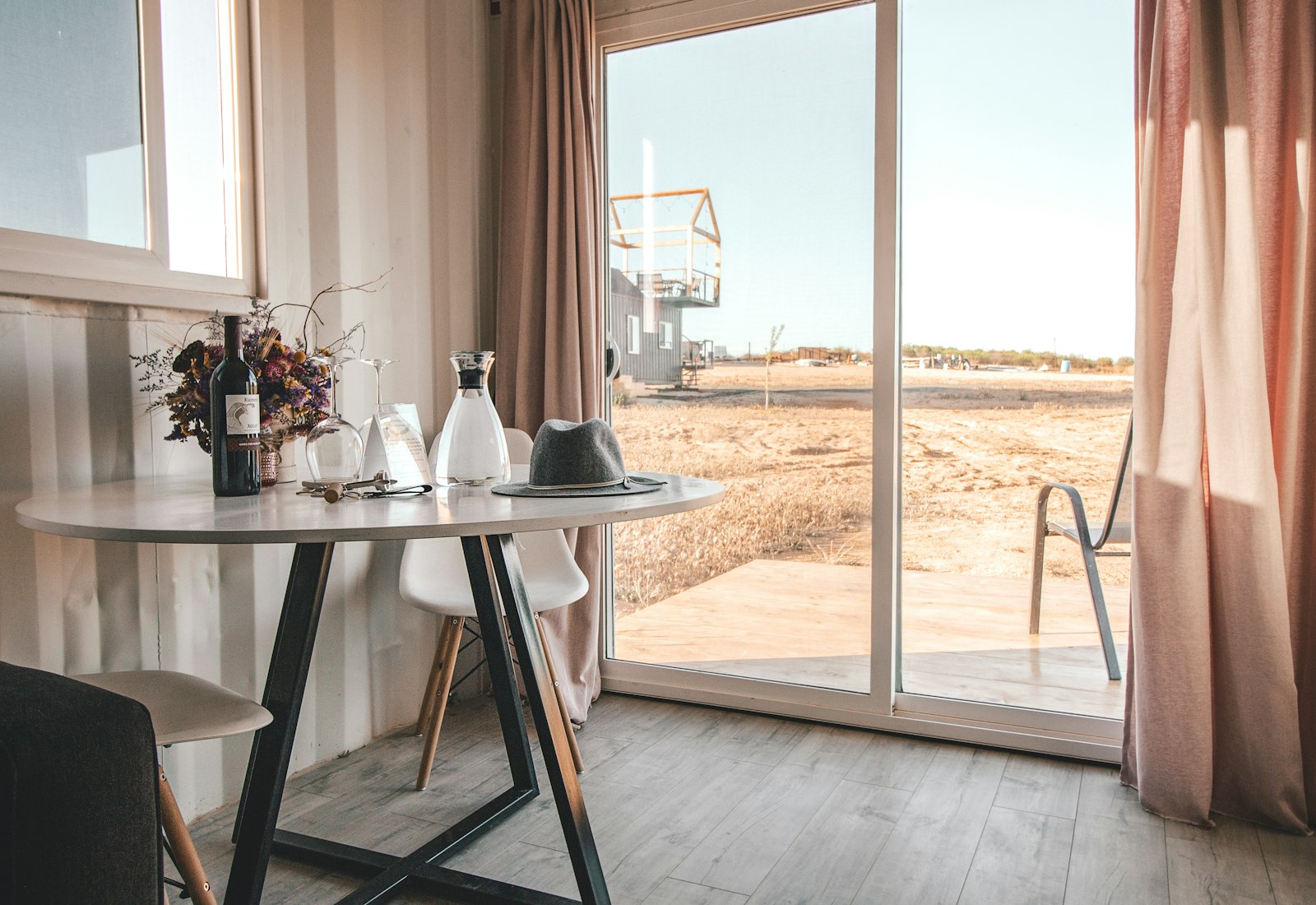 Minimal dining area with warm wood tones